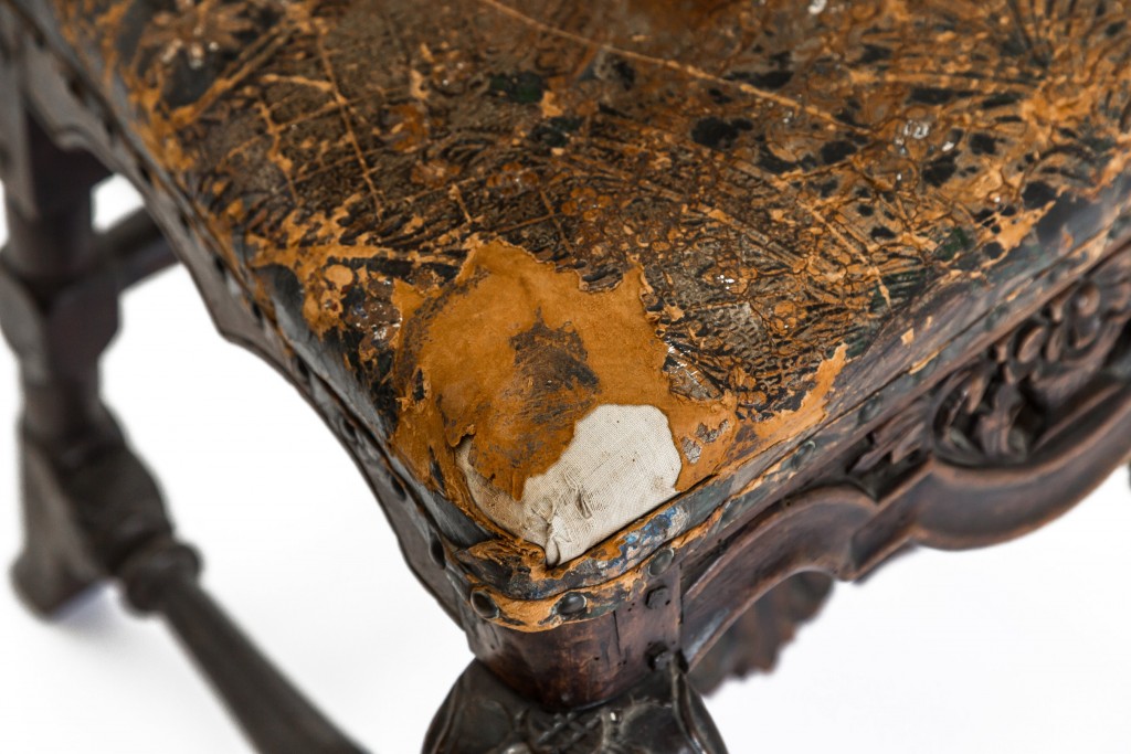 Decorative leather seat torn