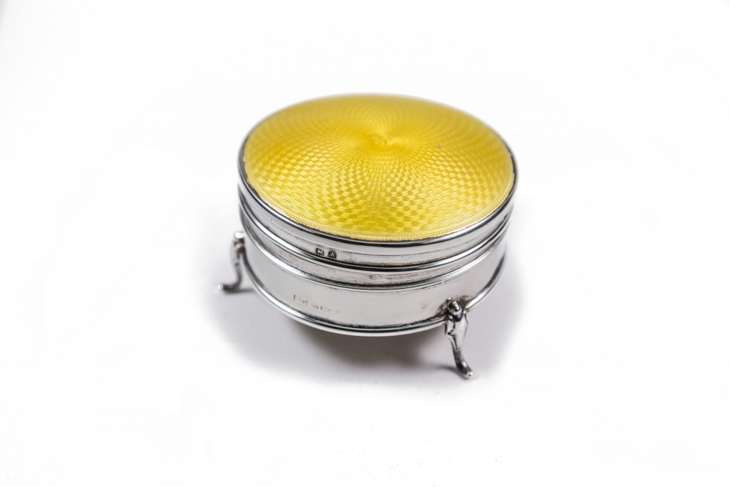 Silver compact with yellow enamel