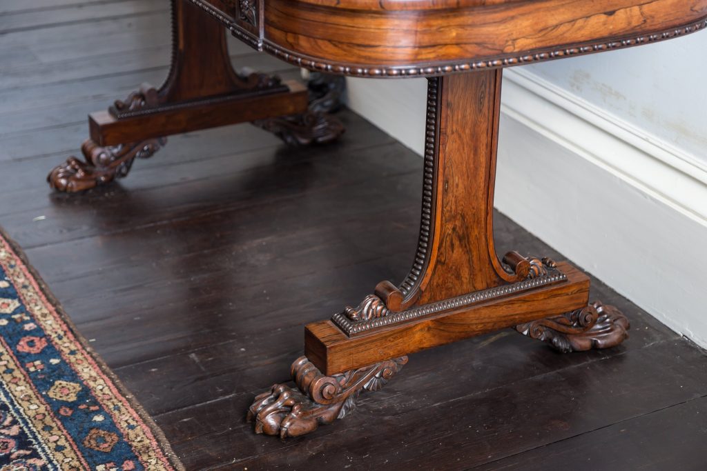 Regency rosewood side table showing fine detail to legs and carved feet