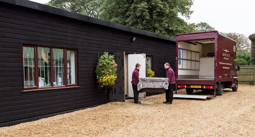 Staff unloading van